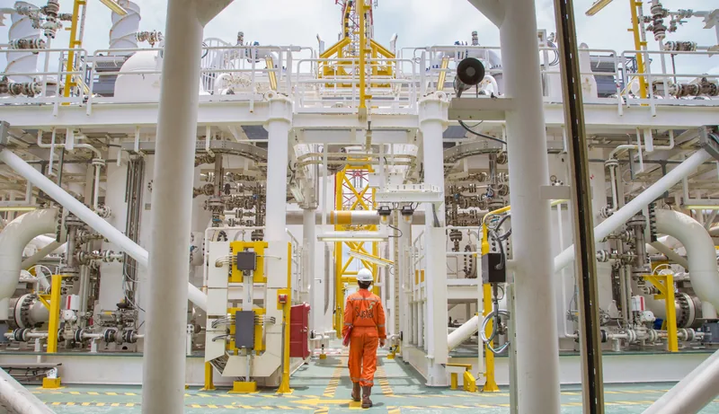 Systel engineer walking a compressed-air plant deck